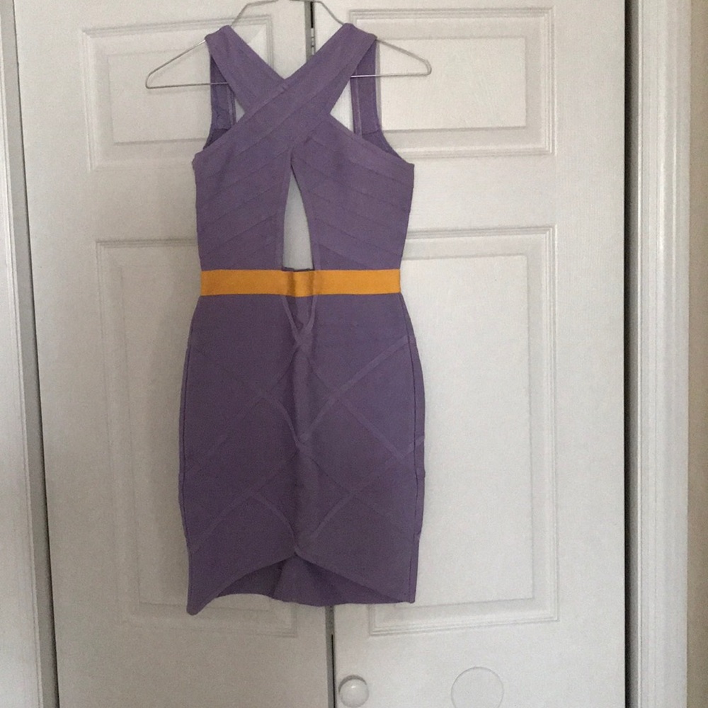 Selling a brand new purple bandage dress.